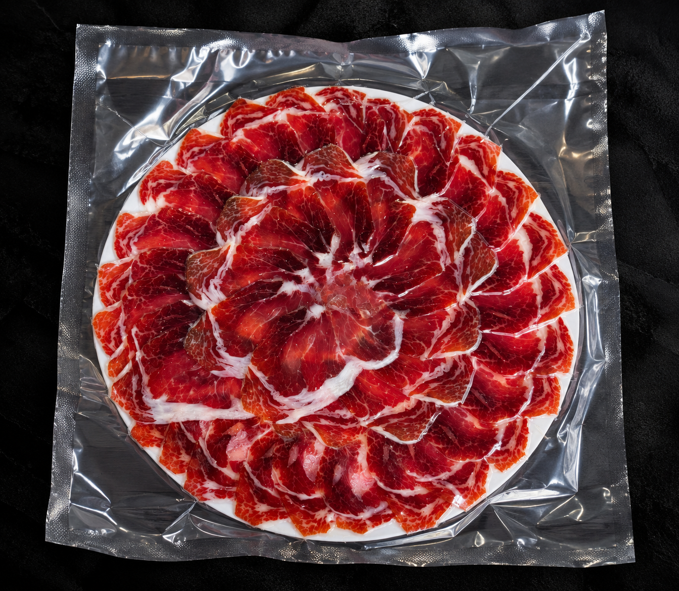 Mandala de paleta presentada en plato y envasada al vacío, así te llega a casa